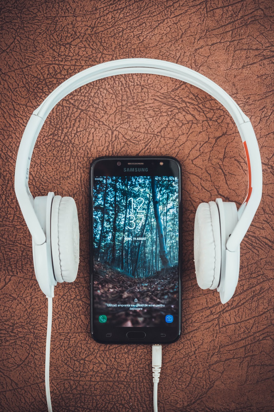 music experience analogy with earphones and smartphone